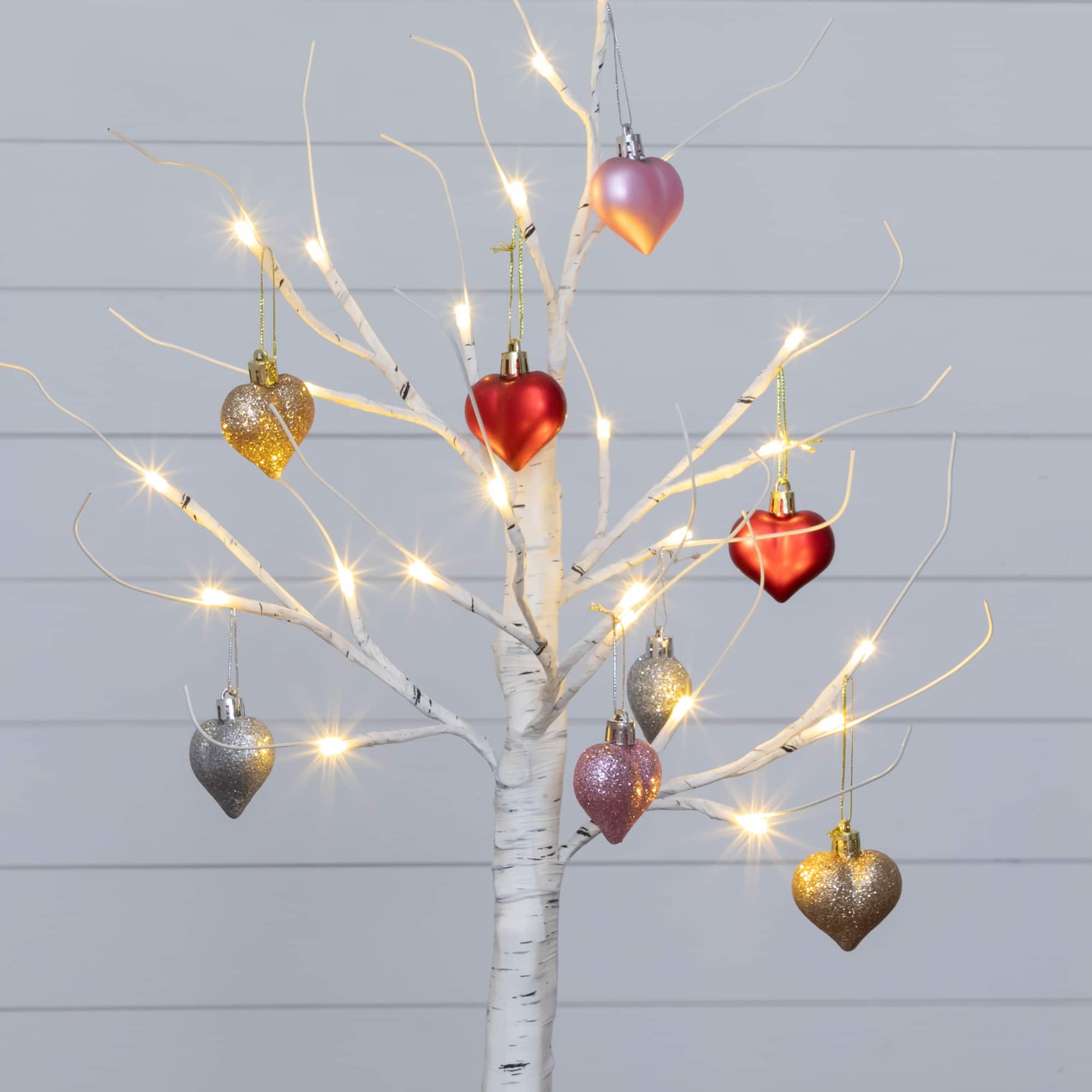 2ft. Pre-Lit Artificial Valentine's Day Twig Tree with 24 Warm White LED Lights and Heart Ornaments